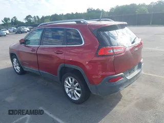 2016 Jeep Cherokee Limited with VIN 1C4PJLDSXGW127497, listed as a IAAI auction lot 42173536 with 240,866 mi miles and . Bid and sale history available at DreamBid. Image 3.