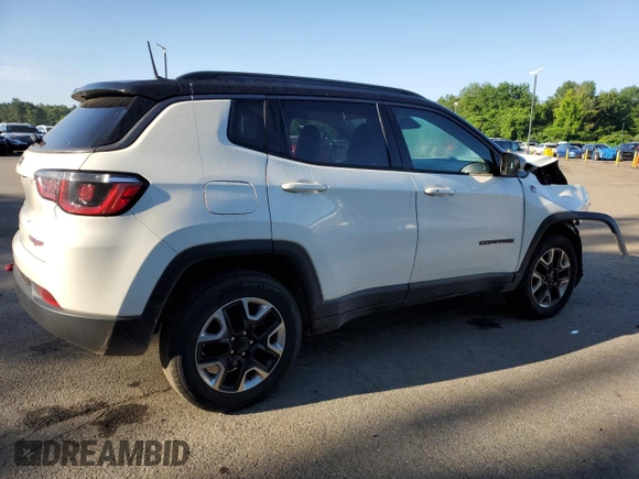 2018 Jeep Compass Trailhawk with VIN 3C4NJDDB9JT451745, listed as a Copart auction lot 61187255 with 88,923 mi miles and Salvage title. Bid and sale history available at DreamBid. Image 3.