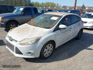 2012 Ford Focus SE with VIN 1FAHP3K23CL251716, listed as a IAAI auction lot 42036099 with 119,600 mi miles. Bid and sale history available at carsss.com. Image 2.