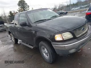 2000 Ford F-150 XL with VIN 1FTRX18W9YNA63551, listed as a IAAI auction lot 41446703 with 1 mi miles. Bid and sale history available at carsss.com. Image 1.