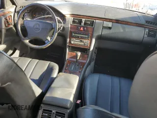 1996 Mercedes-Benz E Class with VIN WDBJF20F9TJ023003, listed as a Copart auction lot 86356784 with 230,944 mi miles and Salvage Title. Bid and sale history available at carsss.com. Image 8.