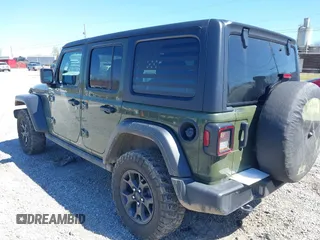 2021 Jeep Wrangler Unlimited Sport S with VIN 1C4HJXDG5MW804748, listed as a IAAI auction lot 41878895 with 35,839 mi miles and . Bid and sale history available at DreamBid. Image 3.