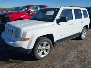 2014 Jeep Patriot Latitude with VIN 1C4NJPFB0ED719270, listed as a IAAI auction lot 40870355 with 207,613 mi miles and . Bid and sale history available at DreamBid. Image 2.