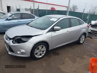 2012 Ford Focus SEL with VIN 1FAHP3H28CL266719, listed as a IAAI auction lot 42008714 with 169,880 mi miles. Bid and sale history available at carsss.com. Image 2.
