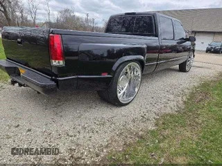 1997 GMC Sierra 3500 z VIN 1GTHC33J5VF005375, wystawiony jako IAAI lot #42298688 z przebiegiem 188 825 mil mil oraz . Historia ofert i sprzedaży dostępna na DreamBid. Obrazek 4.