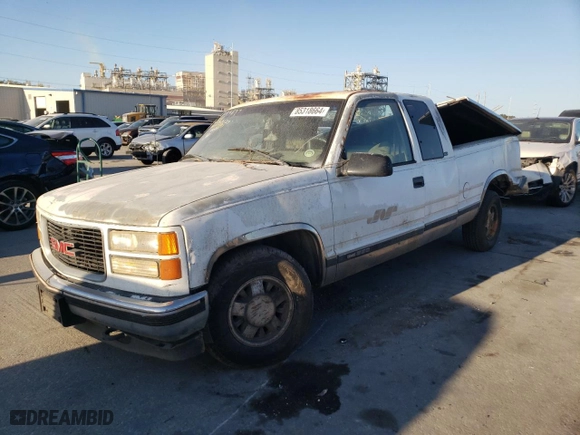 1998 GMC Sierra 1500 with VIN 2GTEC19R3W1521263, listed as a Copart auction lot 85318664 with 0 mi miles and Salvage Title. Bid and sale history available at carsss.com. Image 1.