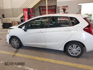 2015 Honda Fit LX with VIN 3HGGK5H57FM106670, listed as a IAAI auction lot 42097655 with 116,303 mi miles and . Bid and sale history available at DreamBid. Image 14.