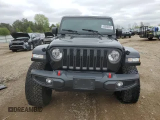 2021 Jeep Wrangler Unlimited Rubicon z VIN 1C4HJXFN1MW793064, wystawiony jako Copart lot #55643305 z przebiegiem 51 944 mil mil oraz Szkoda całkowita • Salvage title. Historia ofert i sprzedaży dostępna na DreamBid. Obrazek 5.
