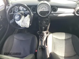 2011 MINI Convertible with VIN WMWZN3C54BT133246, listed as a Copart auction lot 69780074 with 176,955 mi miles and Salvage title. Bid and sale history available at DreamBid. Image 8.