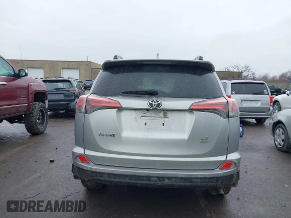 2018 Toyota RAV4 LE with VIN 2T3BFREVXJW717079, listed as a IAAI auction lot 42001580 with 96,044 mi miles. Bid and sale history available at carsss.com. Image 16.