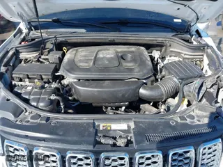 2017 Jeep Grand Cherokee Overland with VIN 1C4RJECGXHC636297, listed as a IAAI auction lot 41661922 with 111,477 mi miles. Bid and sale history available at carsss.com. Image 10.