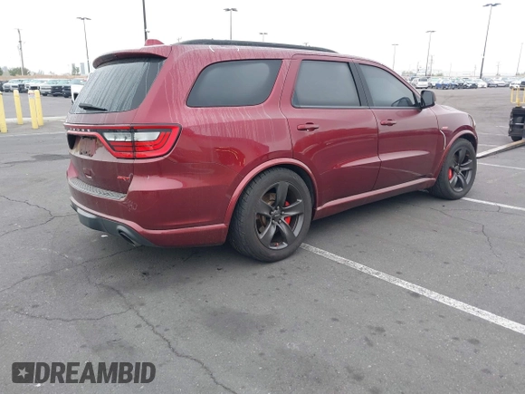 2018 Dodge Durango SRT with VIN 1C4SDJGJ5JC291287, listed as a IAAI auction lot 41862178 with 70,294 mi miles and . Bid and sale history available at DreamBid. Image 4.