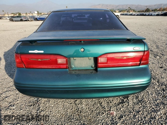 1997 Ford Thunderbird LX z VIN 1FALP62W4VH170423, wystawiony jako Copart lot #83379614 z przebiegiem 93 117 mil mil oraz Szkody całkowita. Historia ofert i sprzedaży dostępna na DreamBid. Obrazek 6.