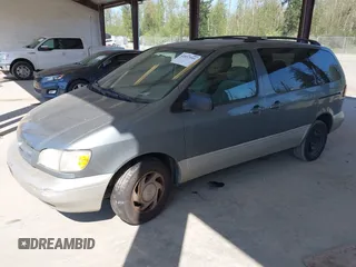1999 Toyota Sienna LE with VIN 4T3ZF13C4XU166786, listed as a IAAI auction lot 42057995 with 316,259 mi miles. Bid and sale history available at carsss.com. Image 17.