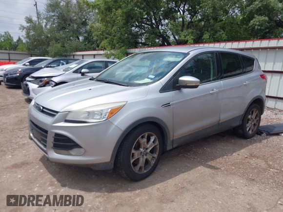 2013 Ford Escape SEL with VIN 1FMCU9H95DUA48886, listed as a IAAI auction lot 42117937 with 244,101 mi miles. Bid and sale history available at carsss.com. Image 2.
