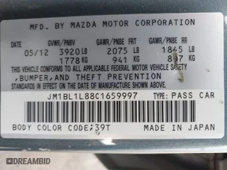 2012 Mazda Mazda3 i Touring with VIN JM1BL1L88C1659997, listed as a IAAI auction lot 41985367 with 235,081 mi miles. Bid and sale history available at carsss.com. Image 9.