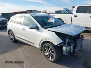 2018 Kia Niro Touring with VIN KNDCE3LC7J5179521, listed as a IAAI auction lot 41310921 with 75,620 mi miles. Bid and sale history available at carsss.com. Image 1.