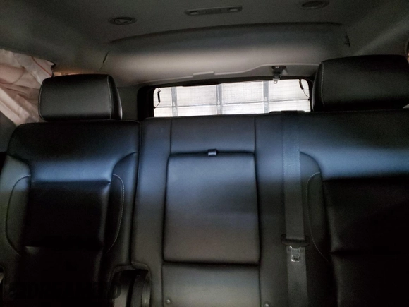 2018 Chevrolet Tahoe LT with VIN 1GNSKBKC7JR361008, listed as a Copart auction lot 55244355 with 76,850 mi miles and Salvage title. Bid and sale history available at DreamBid. Image 10.