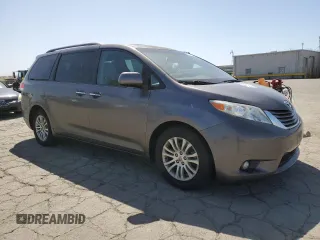 2011 Toyota Sienna XLE AAS with VIN 5TDYK3DC1BS117671, listed as a Copart auction lot 53918185 with 114,136 mi miles and Salvage Title. Bid and sale history available at carsss.com. Image 4.