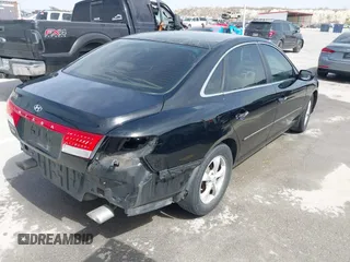 2006 Hyundai Azera SE with VIN KMHFC46F06A113482, listed as a IAAI auction lot 41733834 with 242,159 mi miles and . Bid and sale history available at DreamBid. Image 4.