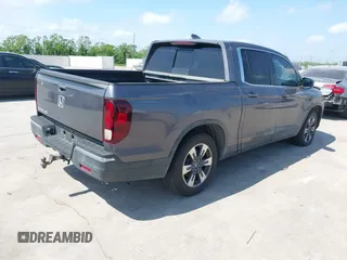 2019 Honda Ridgeline RTL with VIN 5FPYK2F59KB004653, listed as a IAAI auction lot 42066778 with 90,144 mi miles and . Bid and sale history available at DreamBid. Image 4.