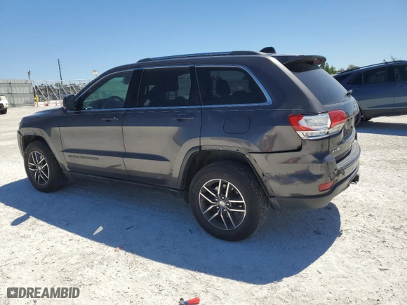 2018 Jeep Grand Cherokee Laredo E with VIN 1C4RJFAG9JC444089, listed as a Copart auction lot 49710925 with 127,707 mi miles and Salvage Title. Bid and sale history available at carsss.com. Image 2.