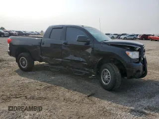 2012 Toyota Tundra with VIN 5TFUW5F10CX213930, listed as a Copart auction lot 60213445 with 147,371 mi miles and Salvage title. Bid and sale history available at DreamBid. Image 4.