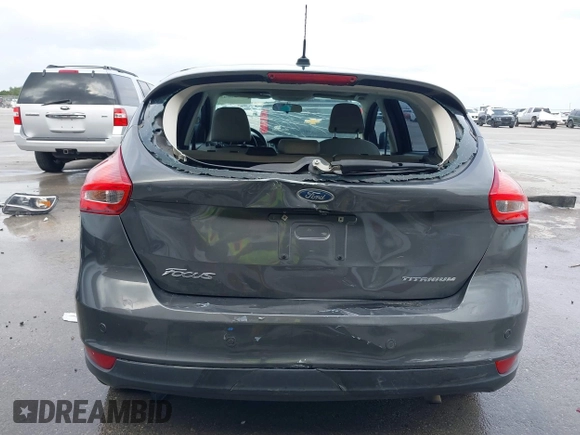 2017 Ford Focus Titanium with VIN 1FADP3N20HL210364, listed as a IAAI auction lot 42130643 with 132,312 mi miles and . Bid and sale history available at DreamBid. Image 17.
