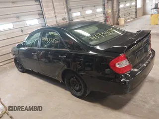 2003 Toyota Camry LE with VIN 4T1BE32K33U171859, listed as a IAAI auction lot 41938515 with 213,447 mi miles and . Bid and sale history available at DreamBid. Image 3.