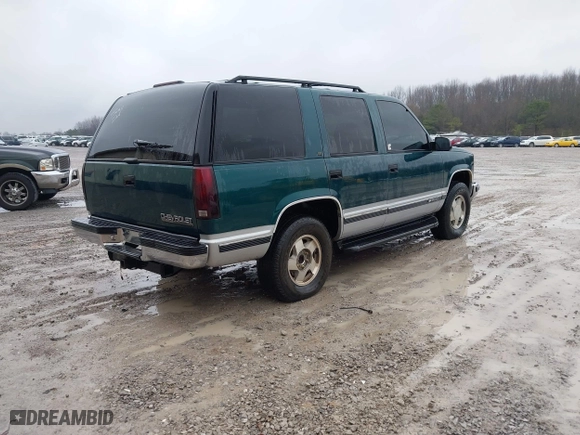 1996 Chevrolet Tahoe with VIN 1GNEK13R1TJ388054, listed as a IAAI auction lot 41368047 with 155,138 mi miles. Bid and sale history available at carsss.com. Image 4.