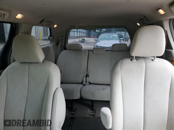 2014 Toyota Sienna L with VIN 5TDZK3DC3ES499663, listed as a Copart auction lot 57615535 with 201,561 mi miles and Salvage title. Bid and sale history available at DreamBid. Image 10.