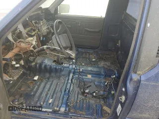 1995 Mitsubishi Mighty Max z VIN JA7LS21G4SP002839, wystawiony jako Copart lot #55777674 z przebiegiem Nie podano mil oraz Tytuł czysty. Historia ofert i sprzedaży dostępna na DreamBid. Obrazek 7.