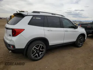 2023 Honda Passport Elite with VIN 5FNYF8H05PB013536, listed as a Copart auction lot 50671155 with 33,815 mi miles and Salvage Title. Bid and sale history available at DreamBid. Image 3.