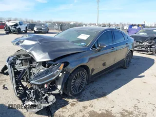 2017 Ford Fusion Hybrid Titanium z VIN 3FA6P0RU0HR314681, wystawiony jako IAAI lot #41288256 z przebiegiem 174 027 mil mil oraz . Historia ofert i sprzedaży dostępna na DreamBid. Obrazek 17.