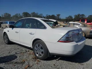 2008 Ford Taurus Limited with VIN 1FAHP28W58G144574, listed as a Copart auction lot 74658954 with 179,824 mi miles and Salvage Title. Bid and sale history available at carsss.com. Image 2.