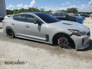 2020 Kia Stinger GT1 with VIN KNAE45LC2L6084091, listed as a Copart auction lot 51410175 with 129,049 mi miles and Salvage Title. Bid and sale history available at DreamBid. Image 4.