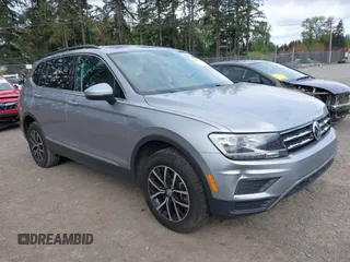 2021 Volkswagen Tiguan SE with VIN 3VV3B7AX0MM008809, listed as a IAAI auction lot 42077986 with 70,780 mi miles and . Bid and sale history available at DreamBid. Image 1.