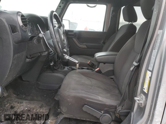 2015 Jeep Wrangler Unlimited Willys Wheeler with VIN 1C4BJWDG9FL516493, listed as a Copart auction lot 45098345 with 152,009 mi miles and Salvage Title. Bid and sale history available at DreamBid. Image 7.