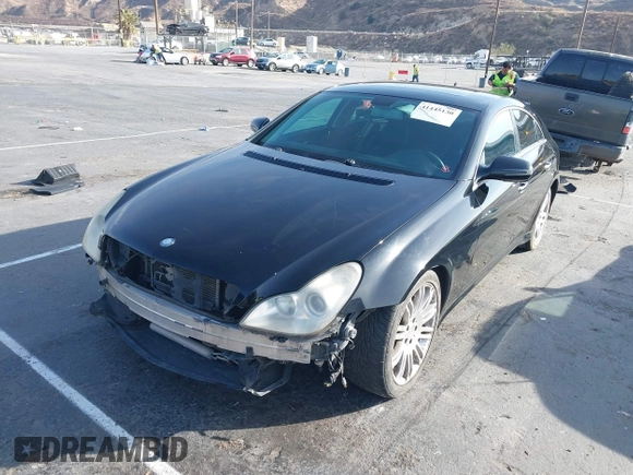 2009 Mercedes-Benz CLS-Class 5.5L with VIN WDDDJ72X99A144208, listed as a IAAI auction lot 41445130 with 189,398 mi miles. Bid and sale history available at carsss.com. Image 2.