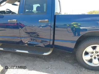 2005 Dodge 1500 SLT with VIN 1D7HA18N95S277995, listed as a IAAI auction lot 41841508 with 212,109 mi miles. Bid and sale history available at carsss.com. Image 6.