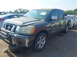 2004 Nissan Titan SE z VIN 1N6AA07A64N548266, wystawiony jako IAAI lot #42596026 z przebiegiem 204 226 mil mil oraz . Historia ofert i sprzedaży dostępna na DreamBid. Obrazek 2.