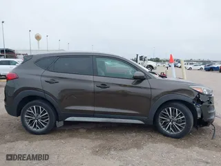 2020 Hyundai Tucson Sport with VIN KM8J33AL3LU156192, listed as a IAAI auction lot 41288165 with 53,210 mi miles. Bid and sale history available at carsss.com. Image 12.