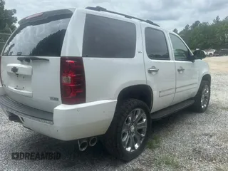 2009 Chevrolet Tahoe LTZ with VIN 1GNFK330X9J100915, listed as a Copart auction lot 55279675 with 254,708 mi miles and Salvage title. Bid and sale history available at DreamBid. Image 4.