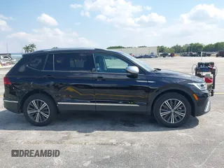 2024 Volkswagen Tiguan with VIN 3VVTB7AX6RM218502, listed as a IAAI auction lot 42063327 with 7,280 mi miles and . Bid and sale history available at DreamBid. Image 14.