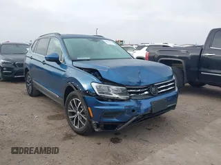 2020 Volkswagen Tiguan SE z VIN 3VV3B7AX7LM057732, wystawiony jako IAAI lot #41881647 z przebiegiem 91 958 mil mil oraz . Historia ofert i sprzedaży dostępna na DreamBid. Obrazek 1.