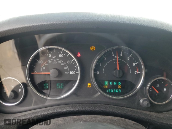 2013 Jeep Wrangler Unlimited Moab with VIN 1C4BJWEG6DL583841, listed as a Copart auction lot 52487915 with 130,369 mi miles and Salvage title. Bid and sale history available at DreamBid. Image 9.