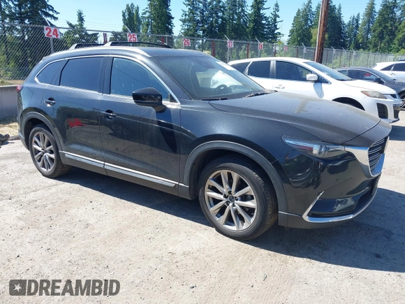 2018 Mazda CX-9 Grand Touring z VIN JM3TCBDY2J0237050, wystawiony jako IAAI lot #42457060 z przebiegiem 130 625 mil mil oraz . Historia ofert i sprzedaży dostępna na DreamBid. Obrazek 1.