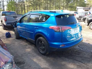 2018 Toyota RAV4 LE with VIN JTMBFREV3JJ253566, listed as a IAAI auction lot 41978107 with 49,729 mi miles. Bid and sale history available at carsss.com. Image 3.