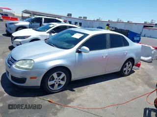 2008 Volkswagen Jetta S with VIN 3VWHM71K58M064797, listed as a IAAI auction lot 42676040 with 211,145 mi miles and . Bid and sale history available at DreamBid. Image 14.