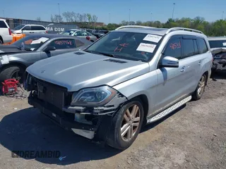 2014 Mercedes-Benz GL 450 z VIN 4JGDF7CE4EA347876, wystawiony jako IAAI lot #42386949 z przebiegiem 133 400 mil mil oraz . Historia ofert i sprzedaży dostępna na DreamBid. Obrazek 2.